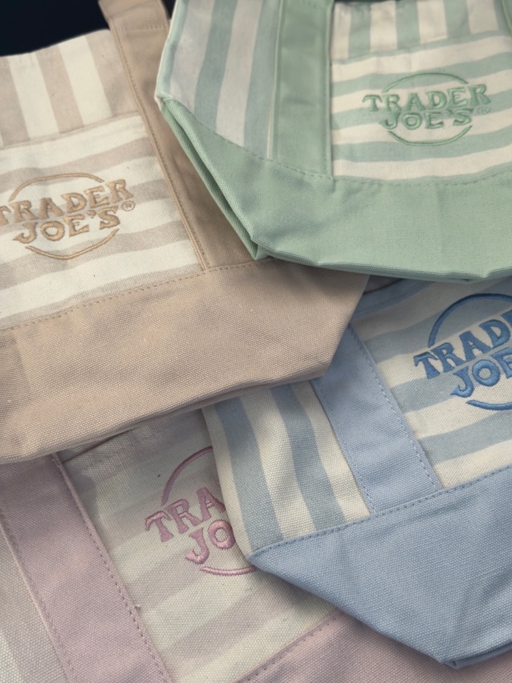 Set of 4 new striped TRADER JOES MINI TOTE BAGS NWT. 1 of each color. Super cute
